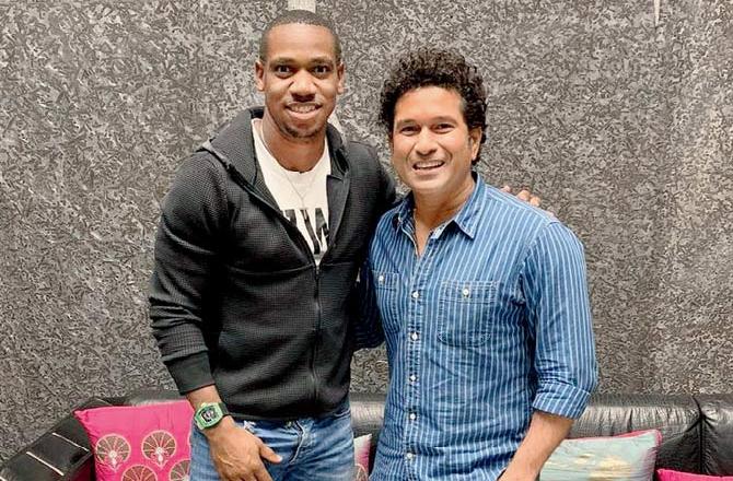 Jamaican sprinter Yohan Blake meets Sachin Tendulkar at his home in Bandra