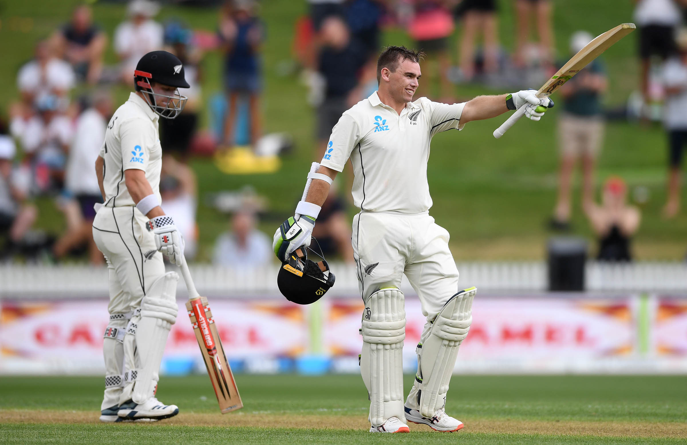 Latham ton guides Black Caps against England
