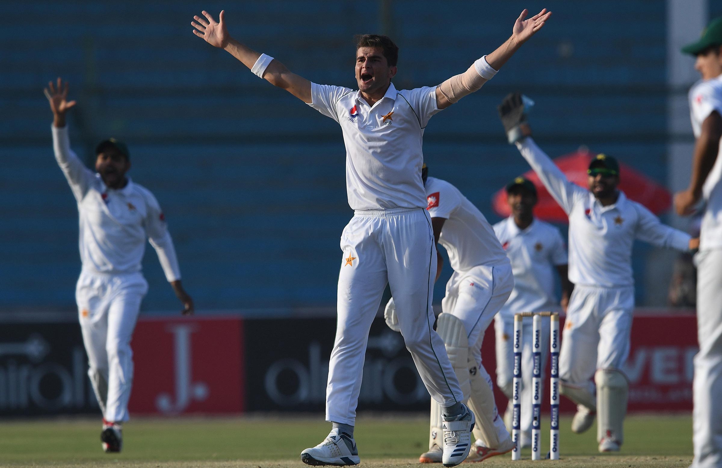 Pakistan fight back after batting collapse