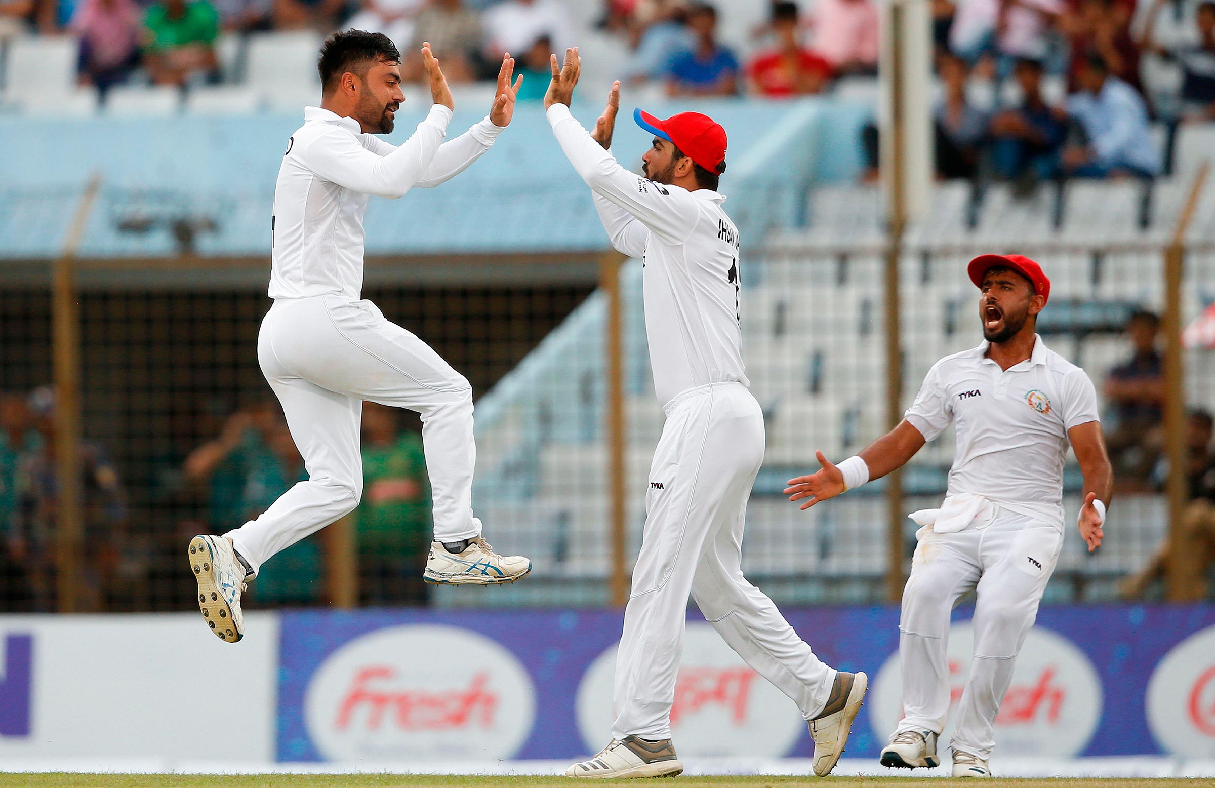 Rashid joins legends as Afghanistan shock Bangladesh