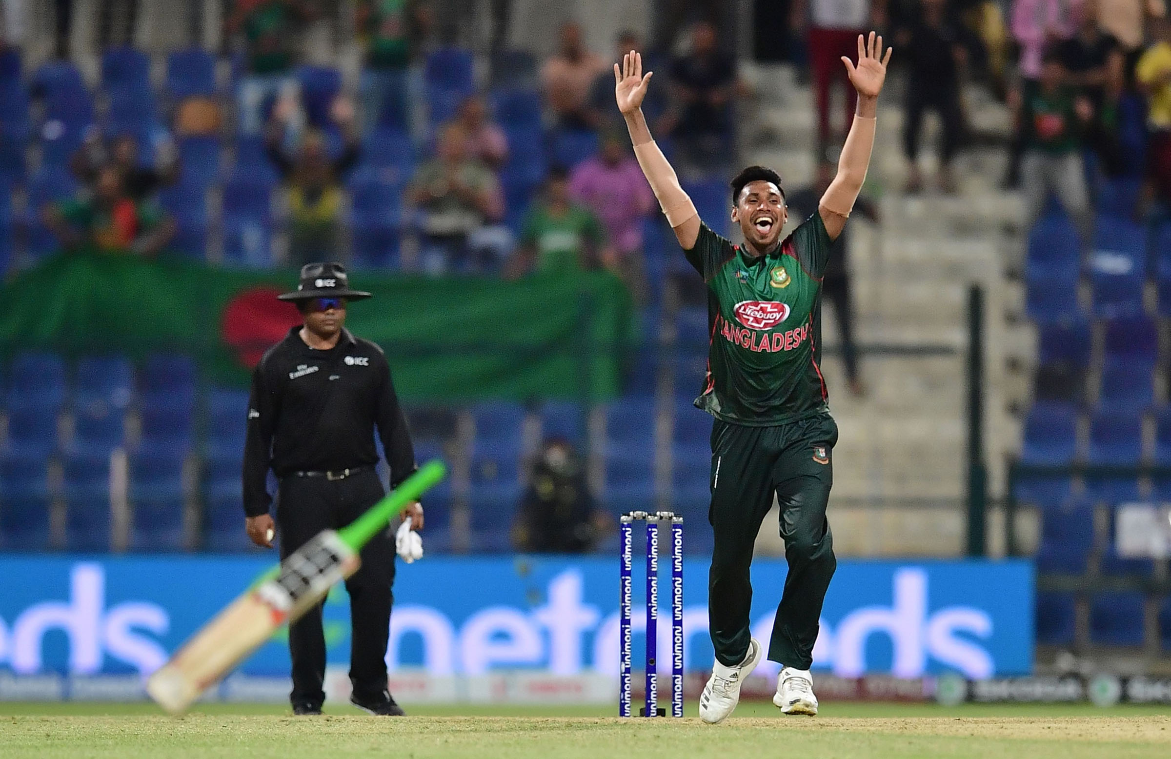 Tigers hold nerve to defeat Afghans