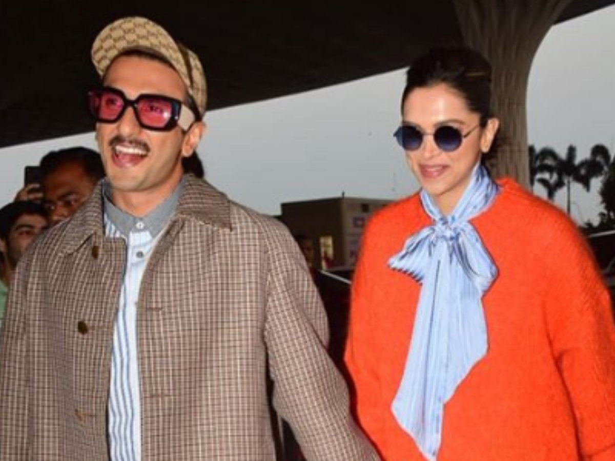 [VIDEO] Birthday girl Deepika Padukone cuts cake at airport with Ranveer Singh and paps