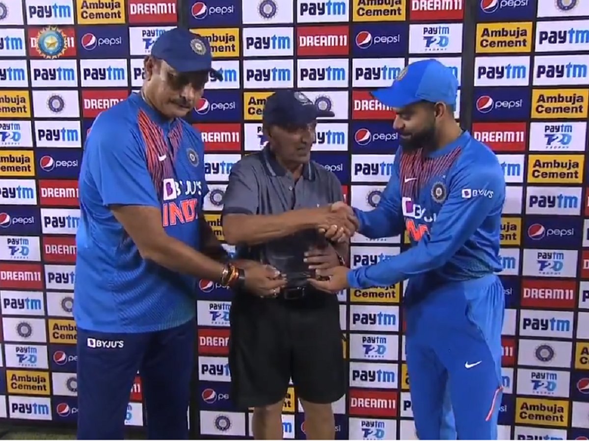 [VIDEO] Virat Kohli, Ravi Shastri felicitate BCCI Chief Curator Daljit Singh ahead of 2nd T20I in Mohali