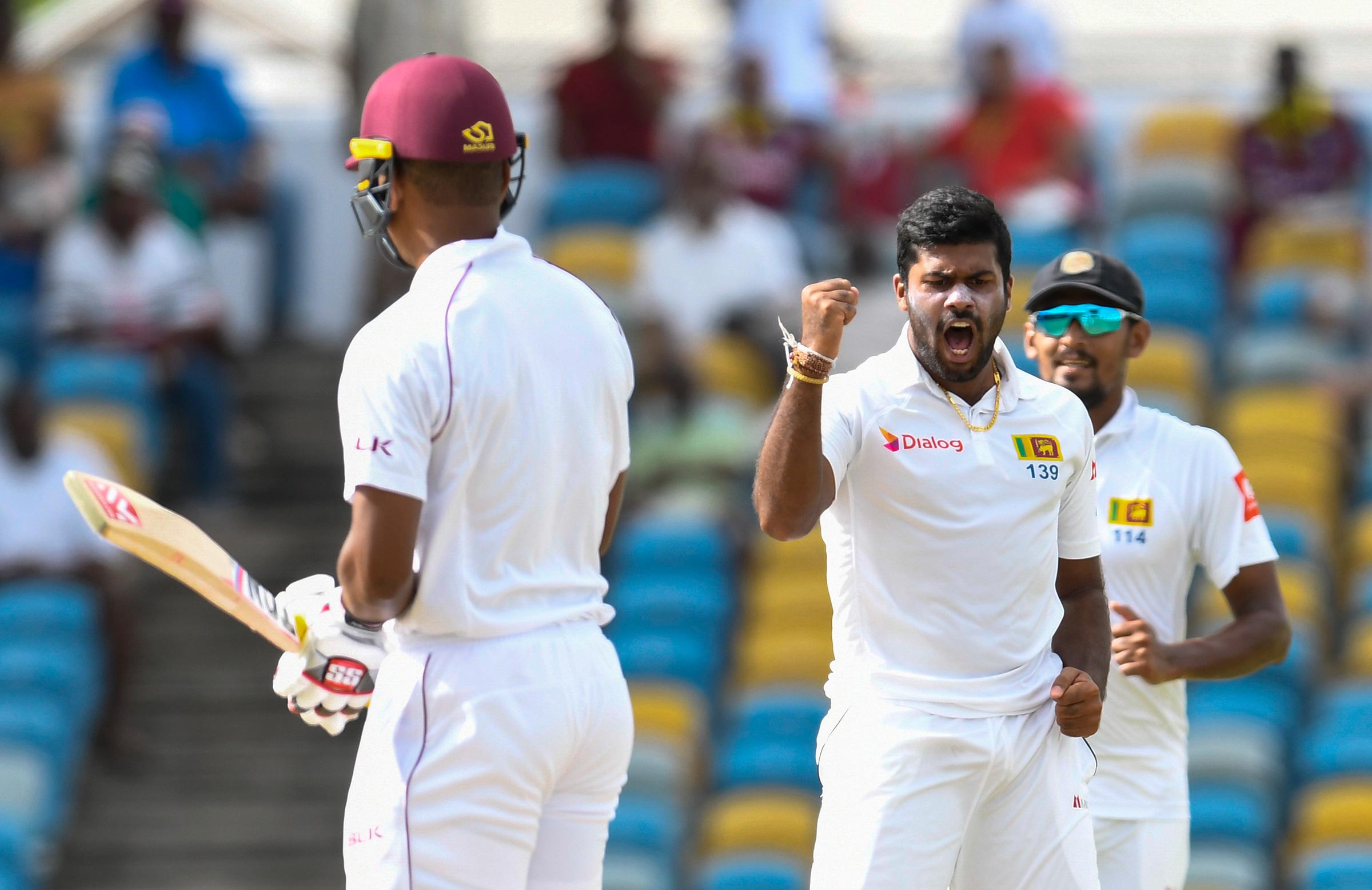 Windies fight back on rain-hit day one